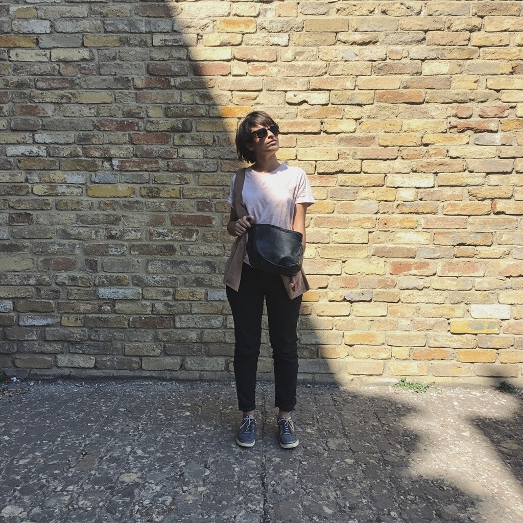 Man Cutting Glass Apple with Fish Inside