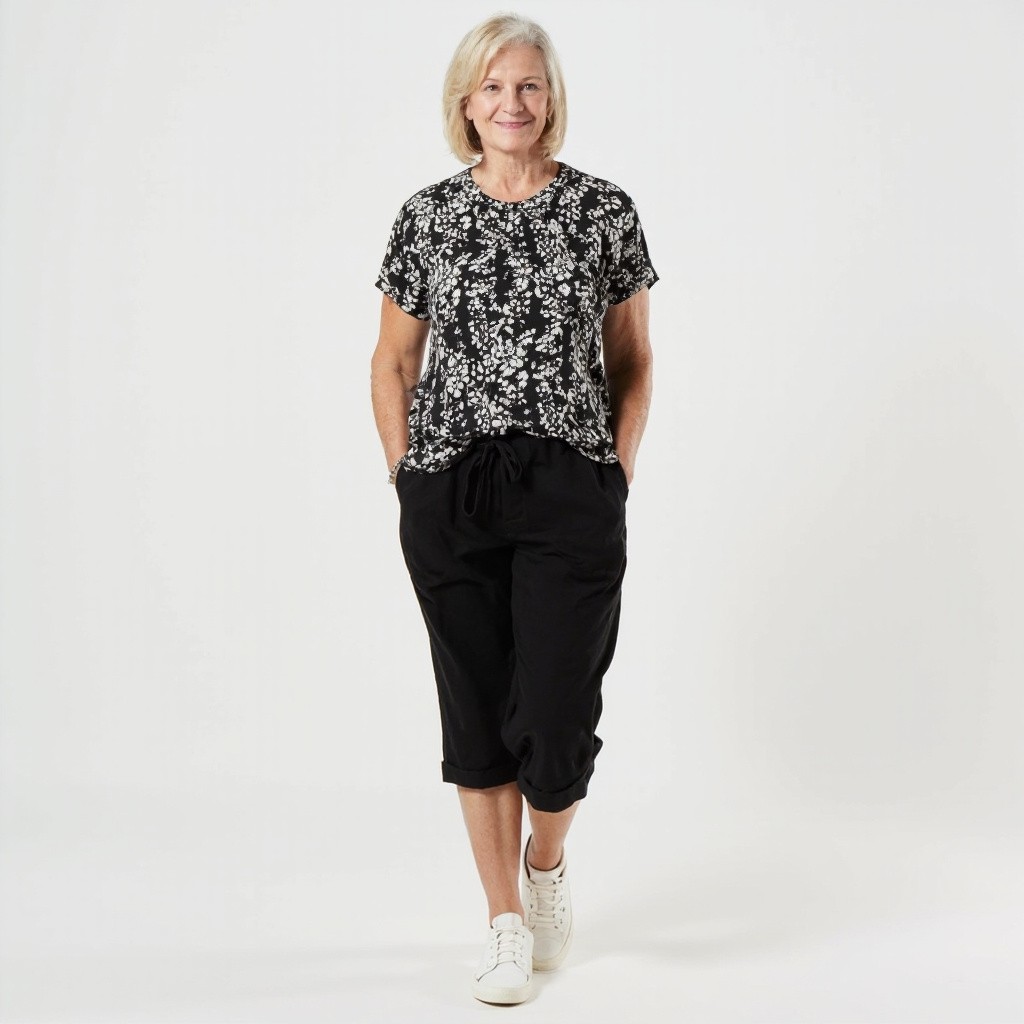 Older Woman in Black and White Outfit
