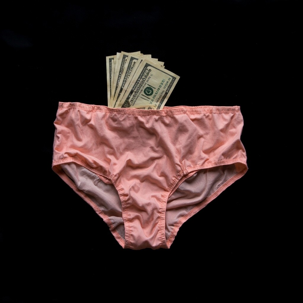 Panties and Money on a Black Background