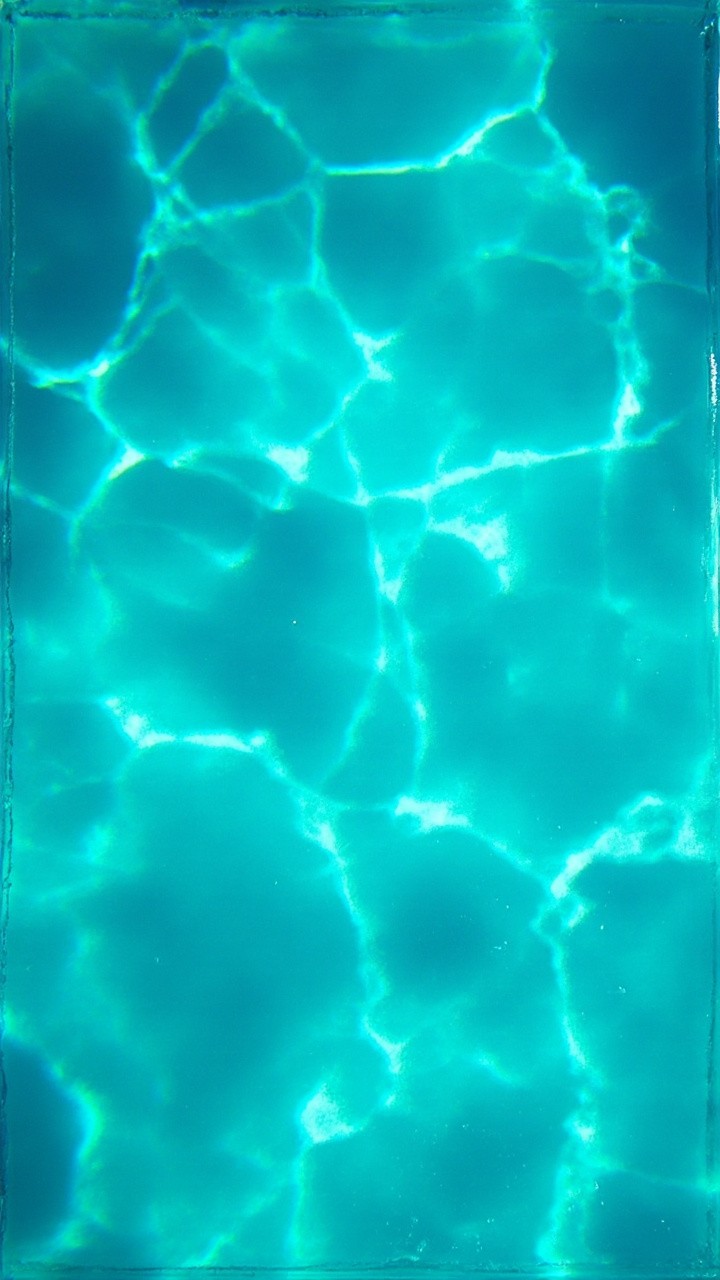 The Bright Cyan Lagoon: A Top-Down View