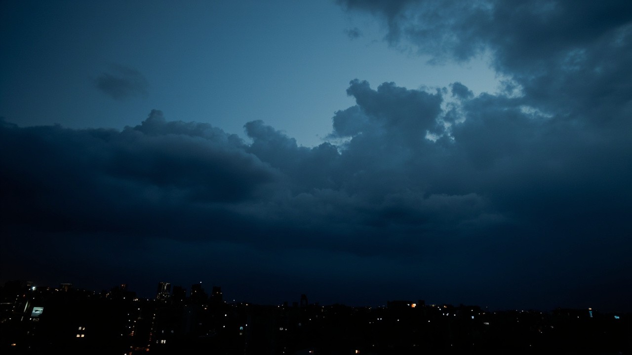 The City at Night Under Cloudy Skies